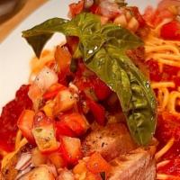 Tonno Alla Marinara · tuna steak, onions, garlic, basil, tomato, spaghetti in house sugo