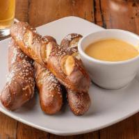 Pretzel Sticks · Traditional soft pretzel sticks served with our house beer cheese