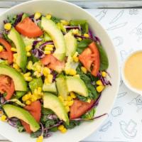 Tex Mex Salad · House blend (romaine, baby spinach, kale, and red cabbage), avocado, corn and ripe tomato wi...
