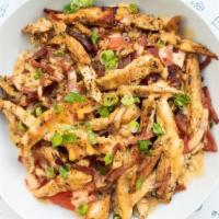 Arroz Con Pollo Bowl · Grilled chicken over Cocobrown rice, turkey bacon, scallions, and ripe tomato with Chipotle ...