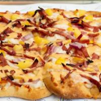 Hawaiian Tex Pizza · Fresh marinara, mozzarella, corn, turkey bacon, pineapple and onions with chipotle sauce. Ma...