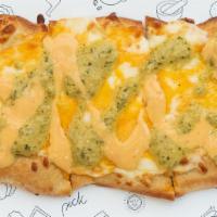 Square Cheesy Bites · Whole wheat flat bread topped with mozzarella, sharp cheddar, cilantro pesto and chipotle sa...