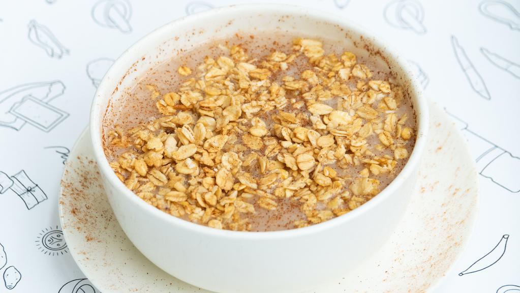 Caribbean Oatmeal · Delicious Hot Oatmeal with coconut and Almond milk.
With granola and cinnamon.