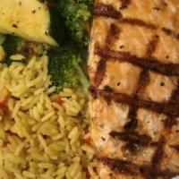 Atlantic Salmon · 8 oz. filet grilled or blackened served with seasoned rice and sautéed vegetables.