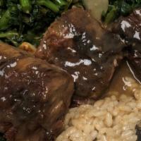 Braised Short Ribs · Short ribs slowly roasted with root vegetables served with mushroom risotto and sautéed broc...
