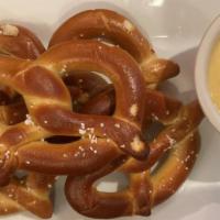 Mini Bavarian Pretzels · Served with spicy brown mustard and nacho cheese dip.