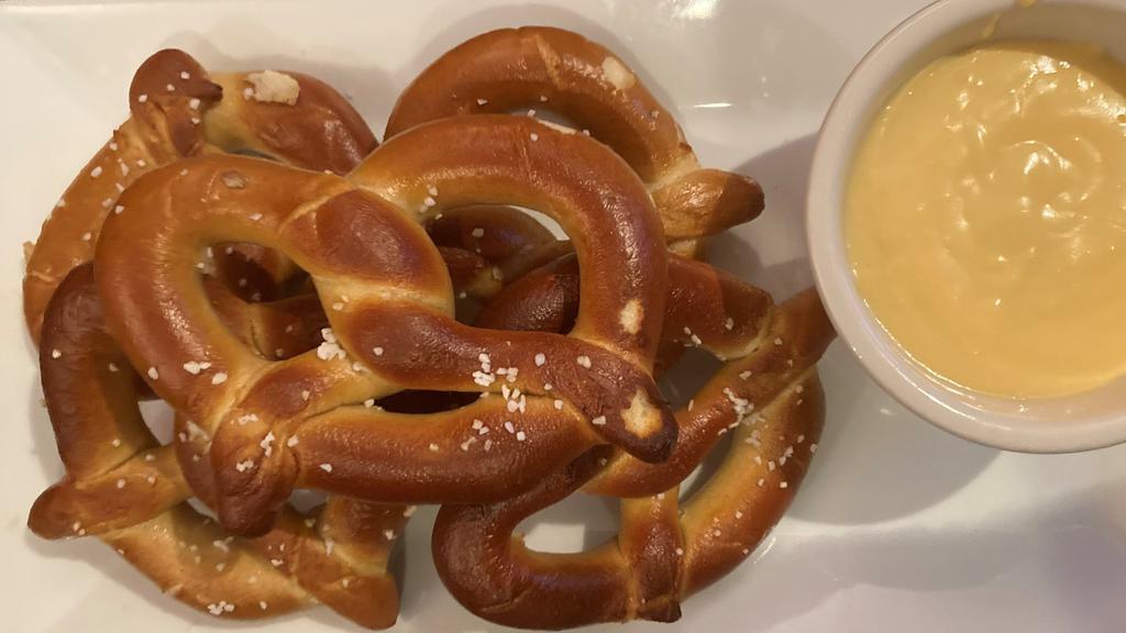 Mini Bavarian Pretzels · Served with spicy brown mustard and nacho cheese dip.