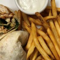 Buffalo Chicken Wrap · Tenderloins and fresh crumbled bleu cheese tossed in a mild Buffalo sauce, with organic baby...