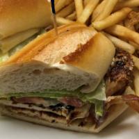 California Club Sandwich · Grilled chicken breast, sliced avocado, applewood bacon and lettuce, tomato, herb mayonnaise...