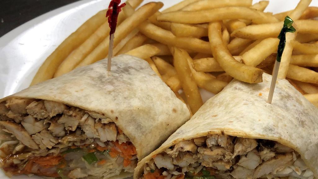 Asian Chicken Wrap · Chopped grilled chicken, shredded carrots, bean sprouts, chopped scallions, shredded cabbage drizzled with Thai peanut sauce.