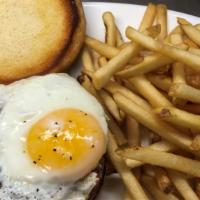 Bacon And Egger Burger · Topped with Jack and cheddar cheese, applewood bacon topped with a fried egg.