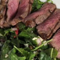 Steak And Gorgonzola Salad · 5 oz. NY strip steak, organic baby spinach, organic baby arugula, sliced red onions, julienn...