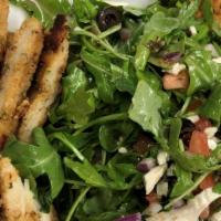 Ava Salad · Breaded chicken cutlet pan-fried over organic baby arugula, diced: grape tomatoes, red onion...