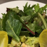 Crab And Avacado Salad · Made with fresh avocado, diced tomatoes and colossal blue point crab meat on a bed of organi...