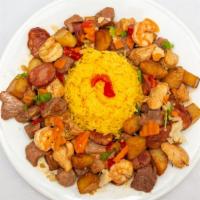 Portugalo Picadinho · Cubed pork, potato, beef, Portuguese sausage and shrimp sauteed with white wine and garlic s...