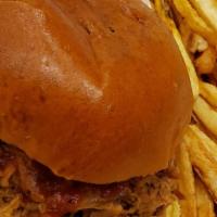 Pulled Pork Sandwich · Slow smoked applewood pulled pork, homemade Portuguese brandy BBQ sauce nestled in a brioche...