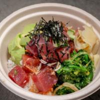 Classic Hawaiian Shoyu Tuna Poke · Fresh sashimi on your choice of rice or a kale and arugula salad. Scallions, onion, cabbage,...