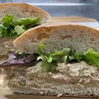 Tuna Salad Sandwich · Tuna salad sandwich with American Cheese, lettuce, tomato,onion, mayo, / roll bread