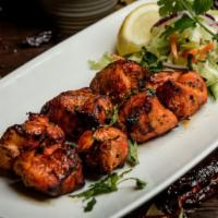 Chicken Tikka · Grilled boneless chicken tenders cooked in a traditional clay oven.