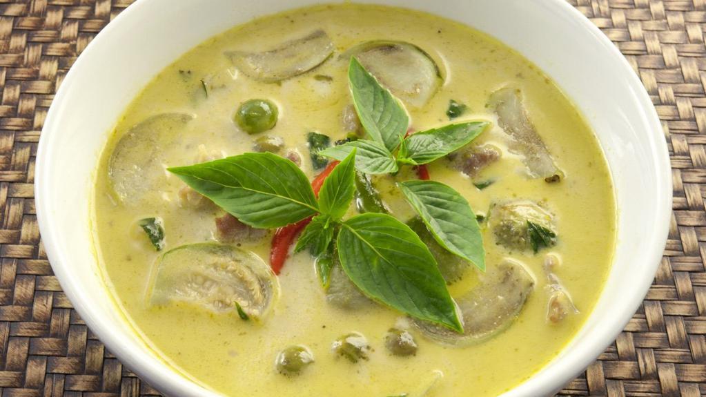 Green Curry · Coconut milk with eggplant, peppers, onions, bamboo shoots, lime leaves and basil leaves.