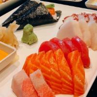 Godzilla Roll · Tuna, salmon, yellowtail, avocado, deep-fried sushi roll with Chef special sauce, fish egg o...