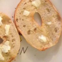 Bagel With Butter · Boiled and baked round bread roll.