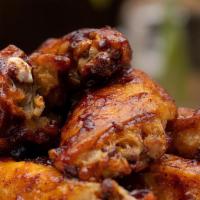Guava Bbq Chicken Wings. · blue cheese dressing, celery sticks