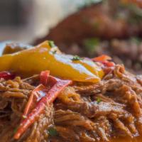 Ropa Vieja For 2. · Shredded flank steak simmered in peppers, onions & tomato. Includes Mixed Greens Salad and c...