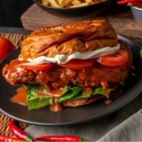 Bacon Buffalo Chicken Tenders Sandwich · Buttermilk fried chicken tenders dipped in buffalo sauce and crispy bacon with your choice o...