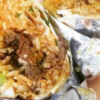 Burrito · Soft flour tortilla stuffed with rice, frijoles, lettuce, tomatoes, sour cream, onions, cila...