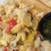 Ackee · Sauteed codfish, onions, peppers, thyme, and fresh garlic. Served with yucca fries.