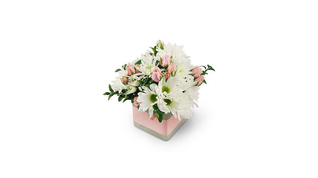 Precious Pinks · Let someone know just how special they are with our Precious Pinks bouquet! Petite pink spray roses bob sweetly among gentle white daisies, filling the room with pure happiness! Neatly nestled in a vase with a pretty pink satin ribbon, it's the perfect arrangement to welcome a new baby, or to make any day extra special. Pink spray roses and white chrysanthemums make up this lovely arrangement, completed with oregonia, pink ribbon, and a frosted glass vase. Product ID UFN1039. Approximately 7