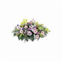 Garden Path Casket Spray · With soothing garden hues and lush blooms, this casket spray provides comfort and expresses ...