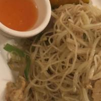 Singapore Mein Fun Noodles · Spicy. Curry sauteed angel hair rice noodles with vegetables and veggie fish cake. Hot and s...