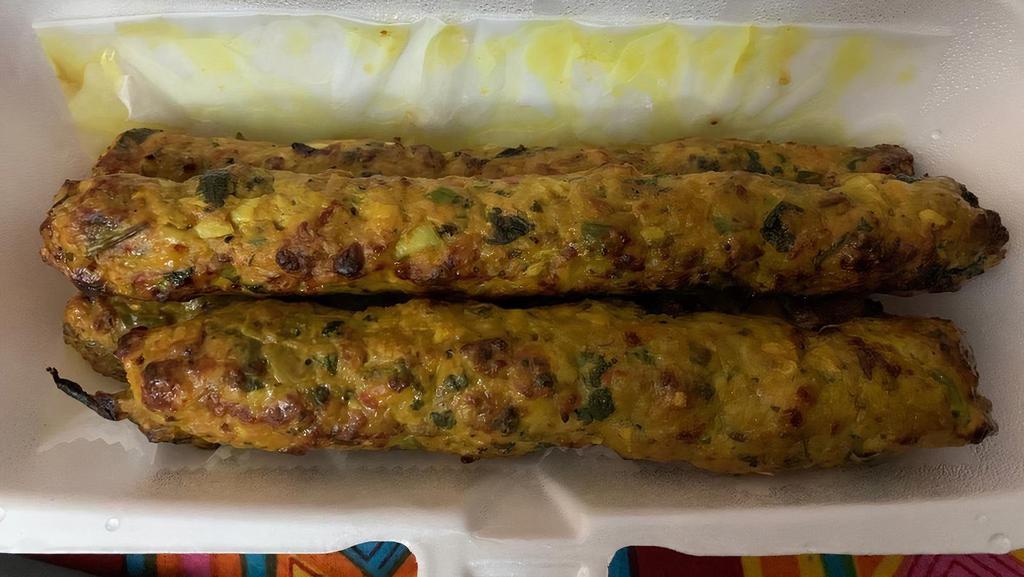Sheekh Kabab · 4 pieces. Ground meat (chicken) seasoned with onions and herbs broiled in tandoor.