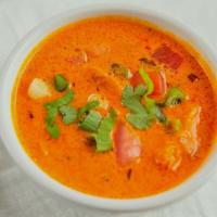 Chicken Tikka Masala · Roasted boneless chicken cooked with bell peppers and fresh tomato sauce.
