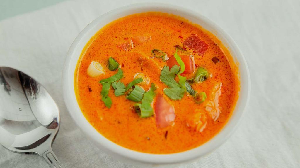 Chicken Tikka Masala · Roasted boneless chicken cooked with bell peppers and fresh tomato sauce.