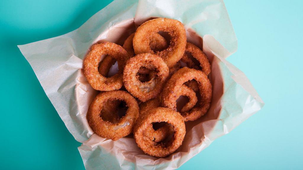Onion Rings · Thick cut, battered onion rings fried until golden and crisp.
