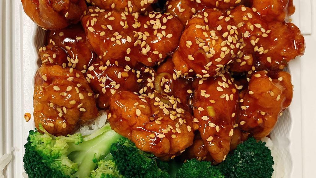 Sesame Chicken · Chunks of tender chicken lightly fried with chef's special sesame sauce. Served with white rice.