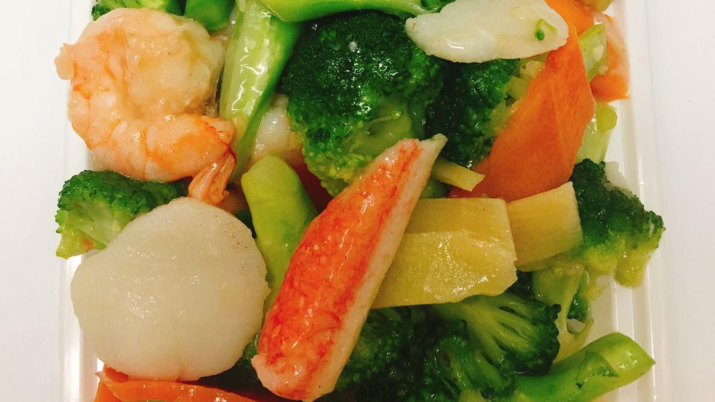 Seafood Delight · Jumbo shrimp, scallops, and crab meat sautéed with vegetables in white sauce.