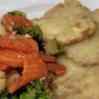 Chicken Francaise · With lemon, white wine, and butter.
