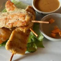 Chicken Sate · Marinated and grilled chicken, peanut reduction and sweet and tangy dipping sauce.