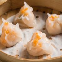 Steamed Dumplings · Six pieces. Choice of pork or chicken. Dim sum and small eat.
