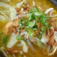 Miso Ramen Soup · Soybean-based noodle soup topped with bean sprout, cabbage, onion, crispy garlic, roast chic...