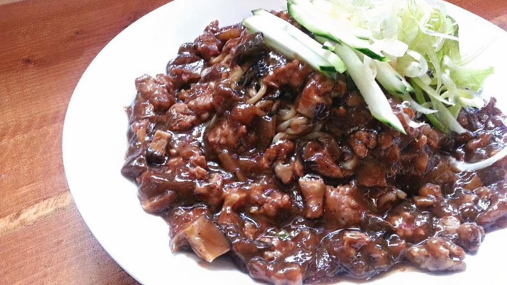 Zha Jiang Mian · Grilled noodle and sweet sauce with ground pork, ginger, garlic, mushroom, bamboo shoots, scallion and cucumber.