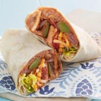 Chicken Fajitas Burrito · Filled with rice, beans, mild salsa, sour cream, mix cheddar, and jack cheese and pico de ga...