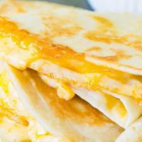 Cheese Quesadilla · Filled with pico de gallo, mixed cheddar and jack cheese, salsa and sour cream on the side.