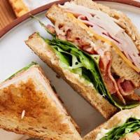Turkey Sandwich · Served with lettuce, tomato and Mayo.