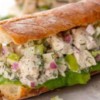 Chicken Salad Sandwich · Served with lettuce and tomatoes.