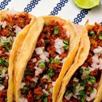 Chorizo Taco · 3 pieces tacos served with onions, and cilantro, reddish, lime, and choice of green or red s...